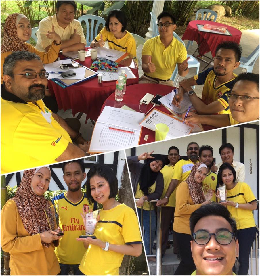 Colleagues in matching shirts during a team-building activity